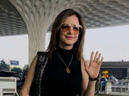Sussanne Khan papped at the airport wearing black top and her funky jeans! Rate her look