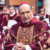 Peter Straughan calls Conclave a “Labor of Love” after 8 Oscar nominations; Ralph Fiennes applauds director Edward Berger