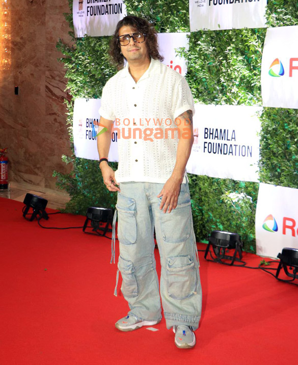 photos ajay devgn malaika arora manushi chhillar and others snapped at bhamla foundations event 4