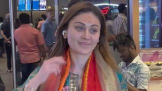 Shefali Jariwala returning from kumb, poses for the paps