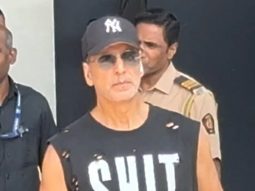 Akshay Kumar in a cool sando which says SHIT HAPPENS