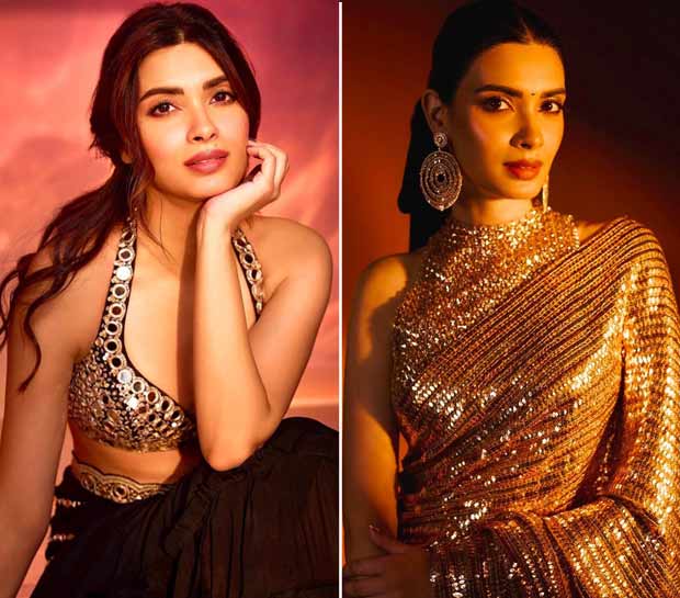 Diana Penty in a black saree with a glasswork blouse.