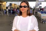Parineeti Chopra wearing a pretty white shirt at the airport