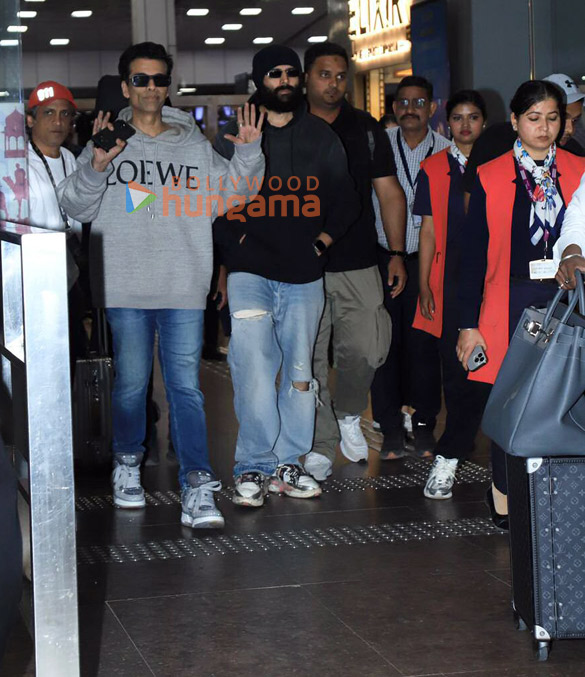 photos shah rukh khan kartik aaryan karan johar and boman irani snapped at jaipur airport for iifa 2025 4