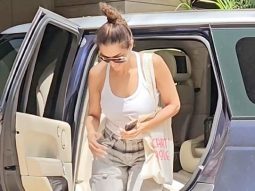 Malaika Arora gets greeted by an adorable doggo!