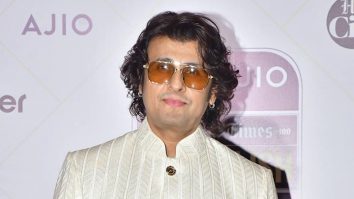A man in a suit ft. Sonu Nigam