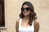 Shalini Panday in a white tee poses for media