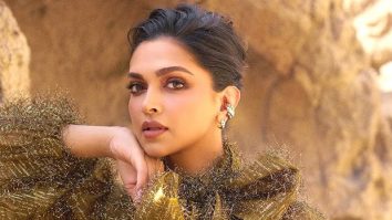 Deepika Padukone stuns in a golden gown and high boots at Forbes Abu Dhabi; watch
