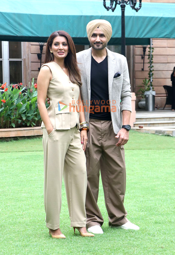 photos former india cricketer harbhajan singh and wife and actress geeta basra unveil their new show whos the boss 5