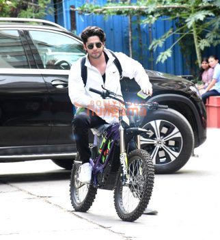 Photos: Jibraan Khan snapped riding an e-bike in Bandra
