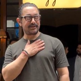 Aamir Khan smiles at paps as he gets clicked at a restaurant in Bandra