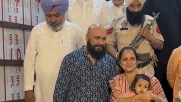 B Praak poses with fans as he gets clicked by paps