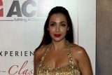 Dazzling as always! Malaika Arora looks gorgeous in this golden tussled outfit
