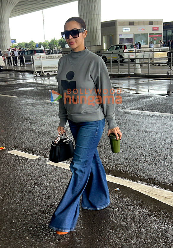 photos malaika arora and mouni roy snapped at the airport 5 2