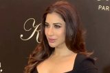 That black dress was made for her! Sophie Choudry poses for paps
