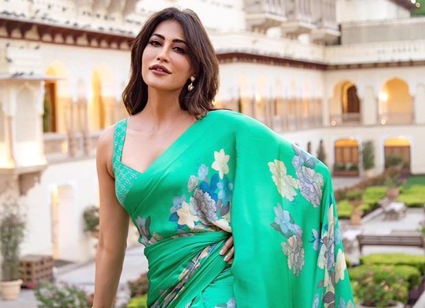 Chitrangda Singh radiates timeless elegance in regal green saree amid majestic palace backdrop