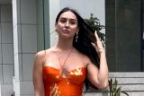 Lauren Gottlieb papped in a super hot orange fit