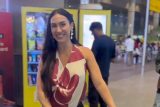 Lauren Gottlieb greets paps with her arrival on the airport
