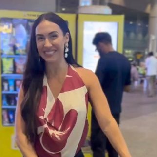 Lauren Gottlieb greets paps with her arrival on the airport