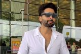 Jackky Bhagnani slays a white shirt look at the airport