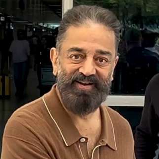 Kamal Hassan greeting fans at the airport
