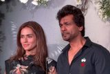 Nikhil Dwivedi with wife pose for media