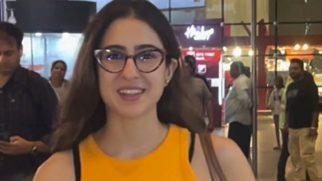 Specsy Sara Ali Khan papped at the airport in an orange tee