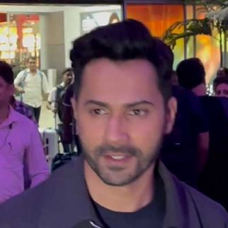Varun Dhawan poses for a selfie with fan at the airport