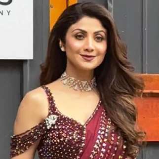 Shilpa Shetty stealing hearts in a gorgeous red saree