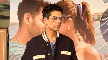 Karan Johar pose for media