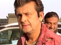 Sonu Nigam pose for media at the airport