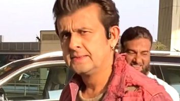 Sonu Nigam pose for media at the airport