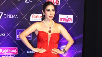 Sophie Choudry steals the show in a bold red gown