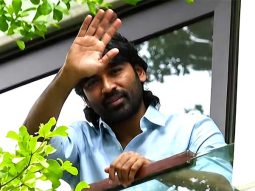Dhanush celebrates 43rd birthday by greeting fans gathered outside his residence