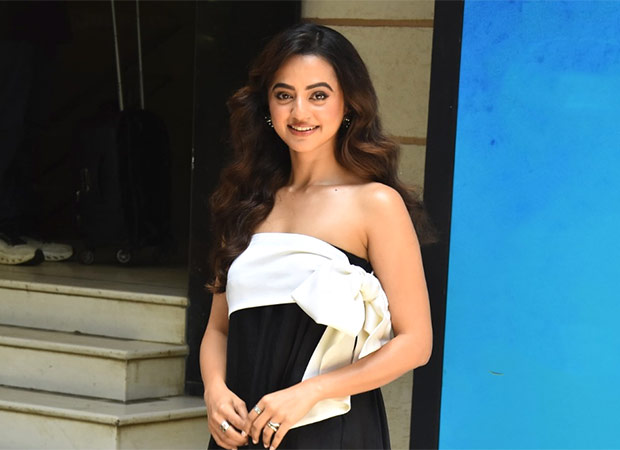 Helly Shah makes a ‘chic statement’ in a strapless black midi dress with a dramatic white bow detail