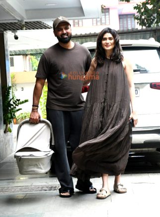 Photos: Karishma Tanna snapped with her husband and her newborn child as she returns to her home in Bandra