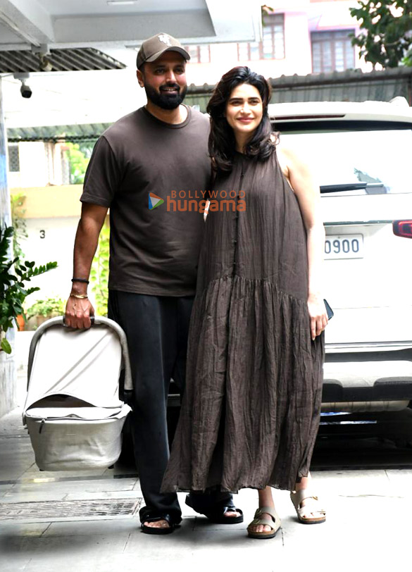 photos karishma tanna snapped with her husband and her newborn child as she returns to her home in bandra 5