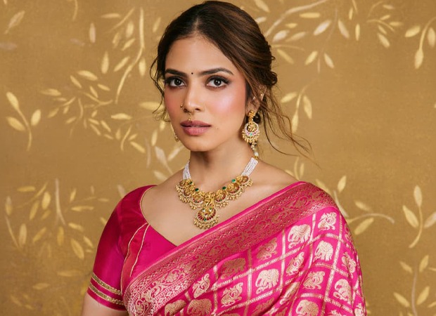 Malavika Mohanan brings regal South Indian elegance to the fore in a magenta-pink silk saree